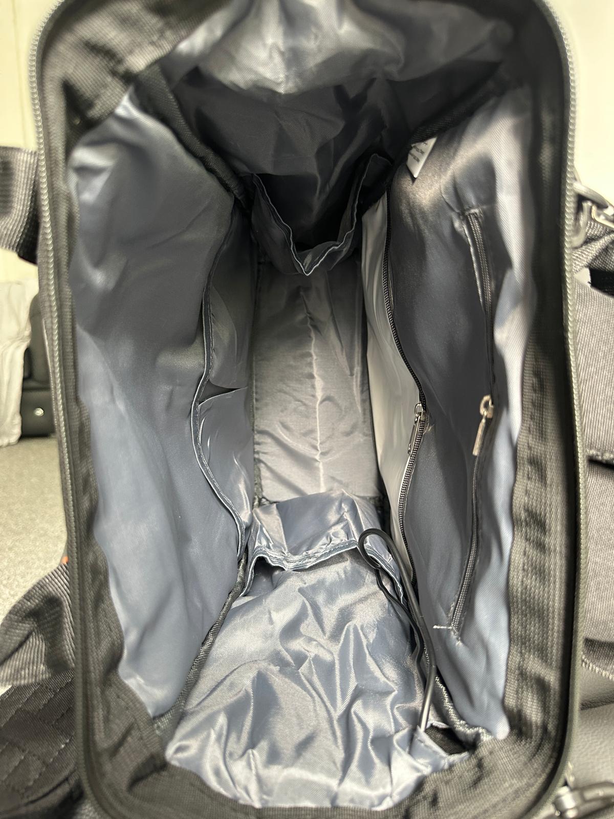 NestnGo changing backpack in black — front view showing clean unisex adult design