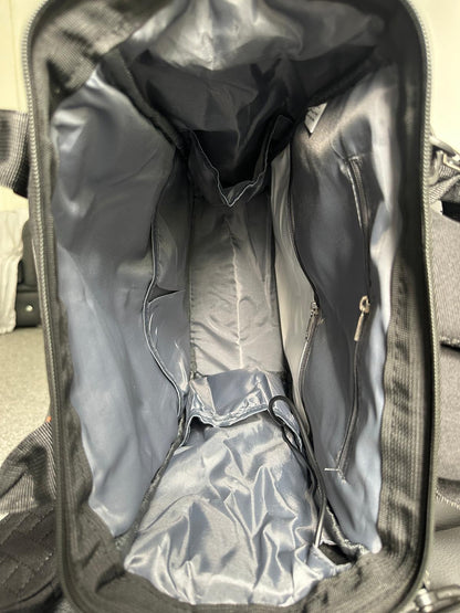 NestnGo changing backpack in black — front view showing clean unisex adult design