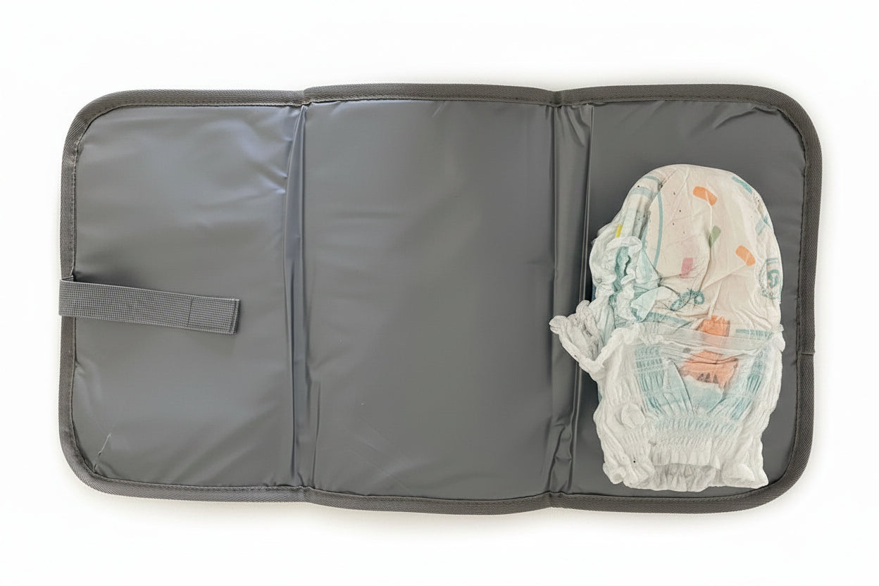 NestnGo changing bag interior — insulated bottle pocket and wet/dry separation pocket