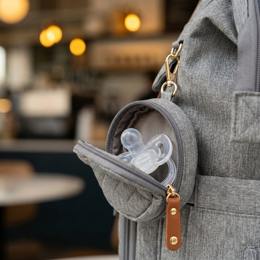 Detachable pacifier pouch with pacifier