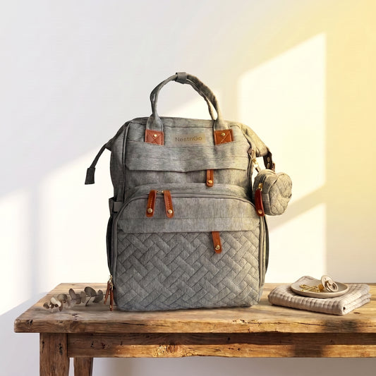 nappy bag on a table front view Grey