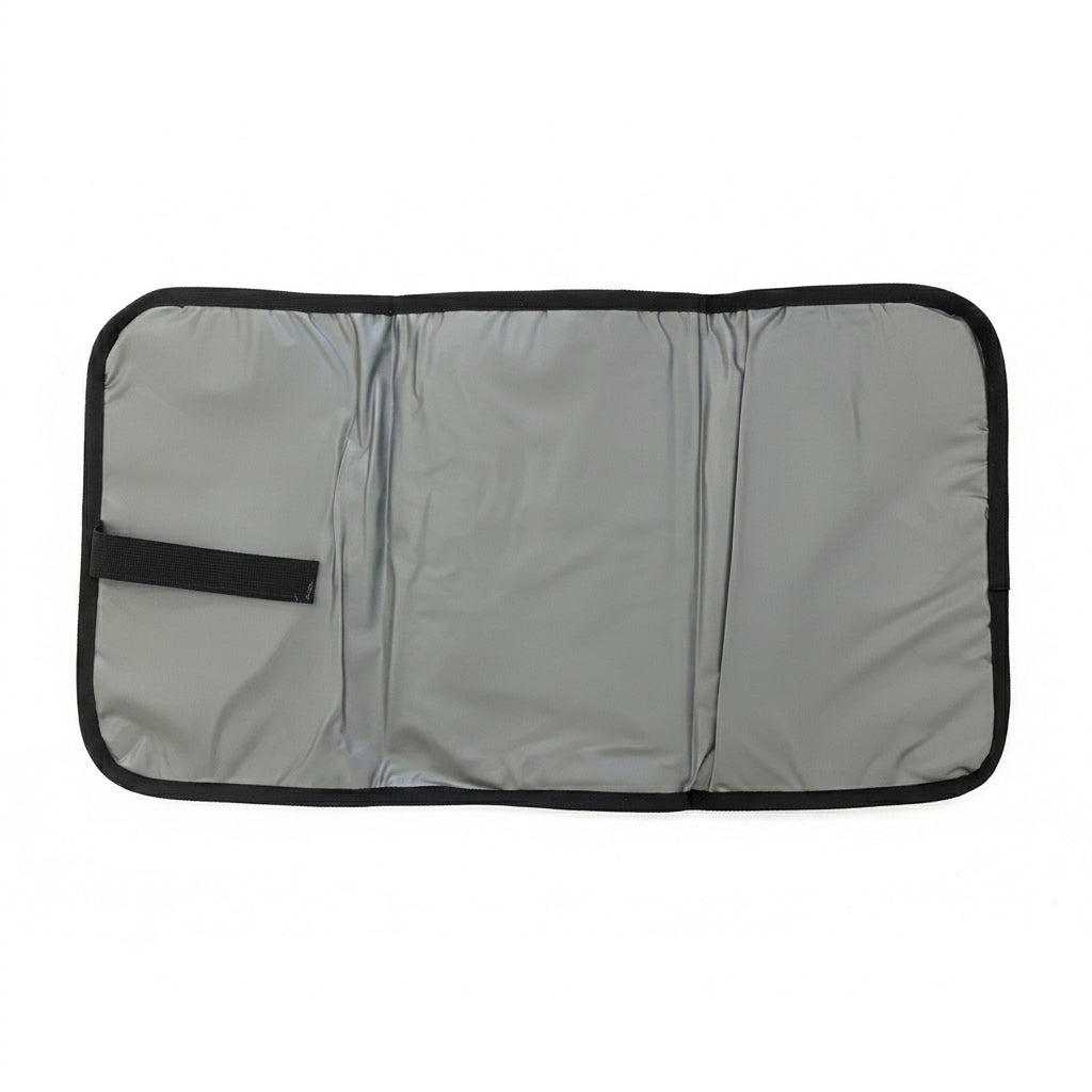 Foldable wipe-clean changing mat included with NestnGo changing bag — Charcoal Black