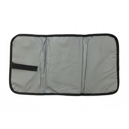 Foldable wipe-clean changing mat included with NestnGo changing bag — Charcoal Black